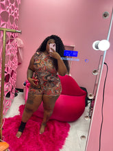 The Swirl Sheer Back out Romper