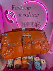 Orange buckle purse