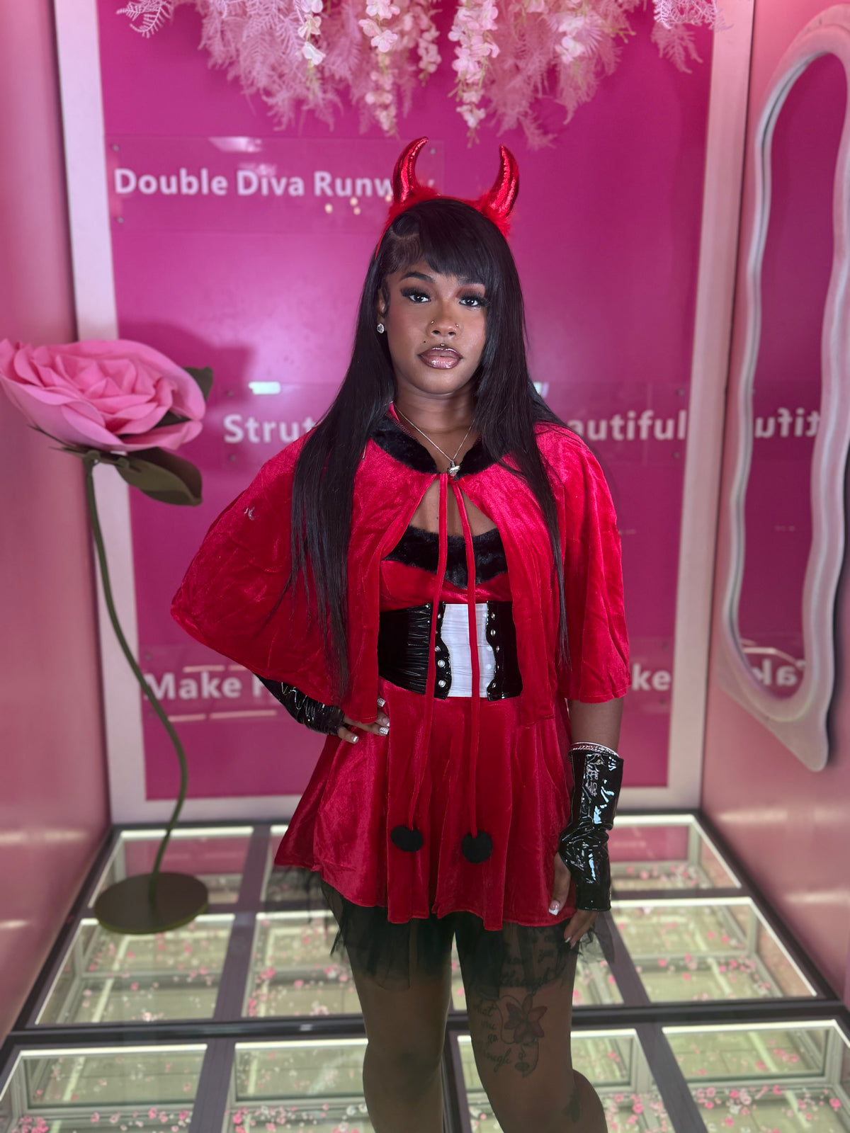 The sexy devil in a dress costume
