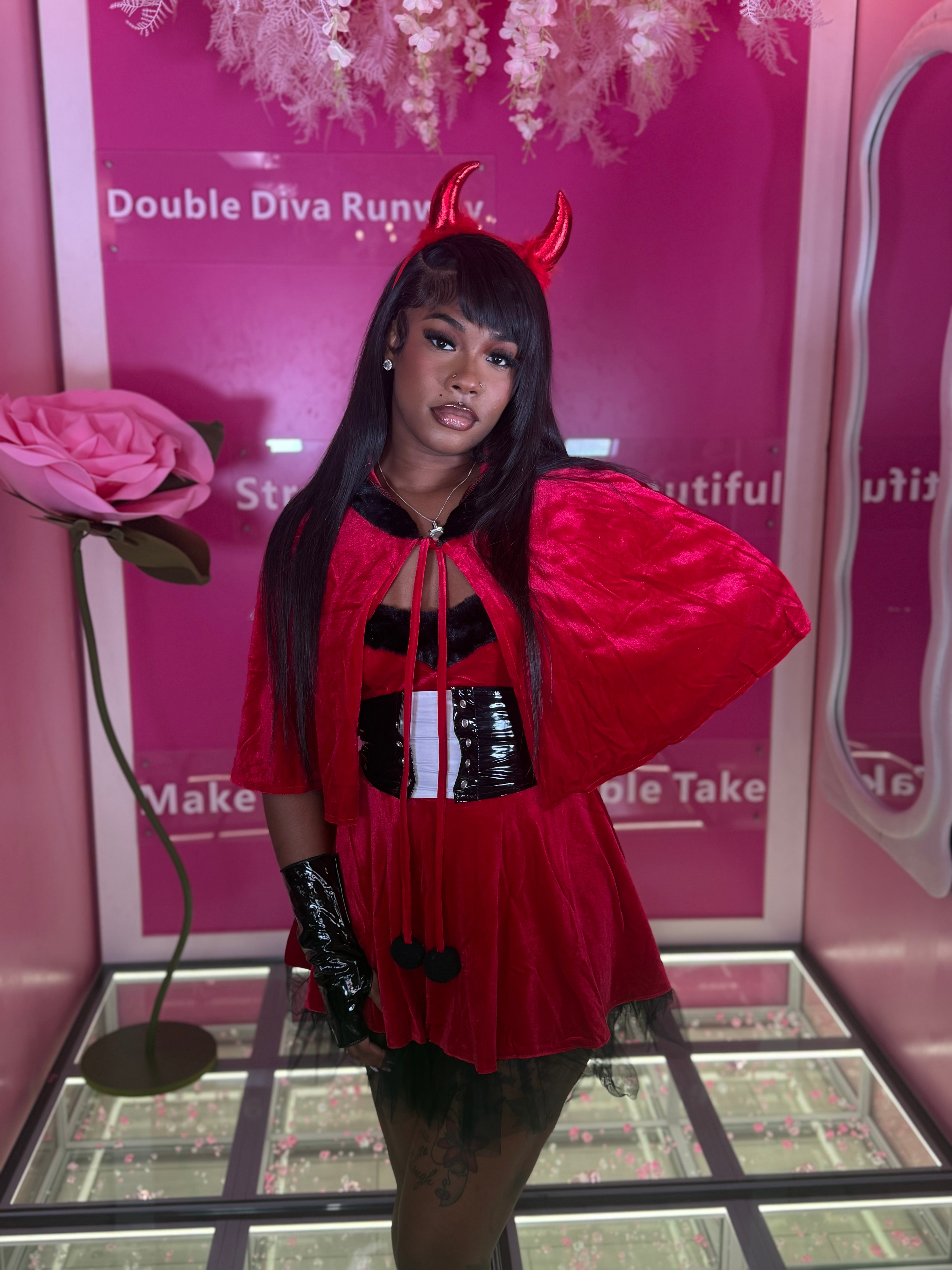 The sexy devil in a dress costume