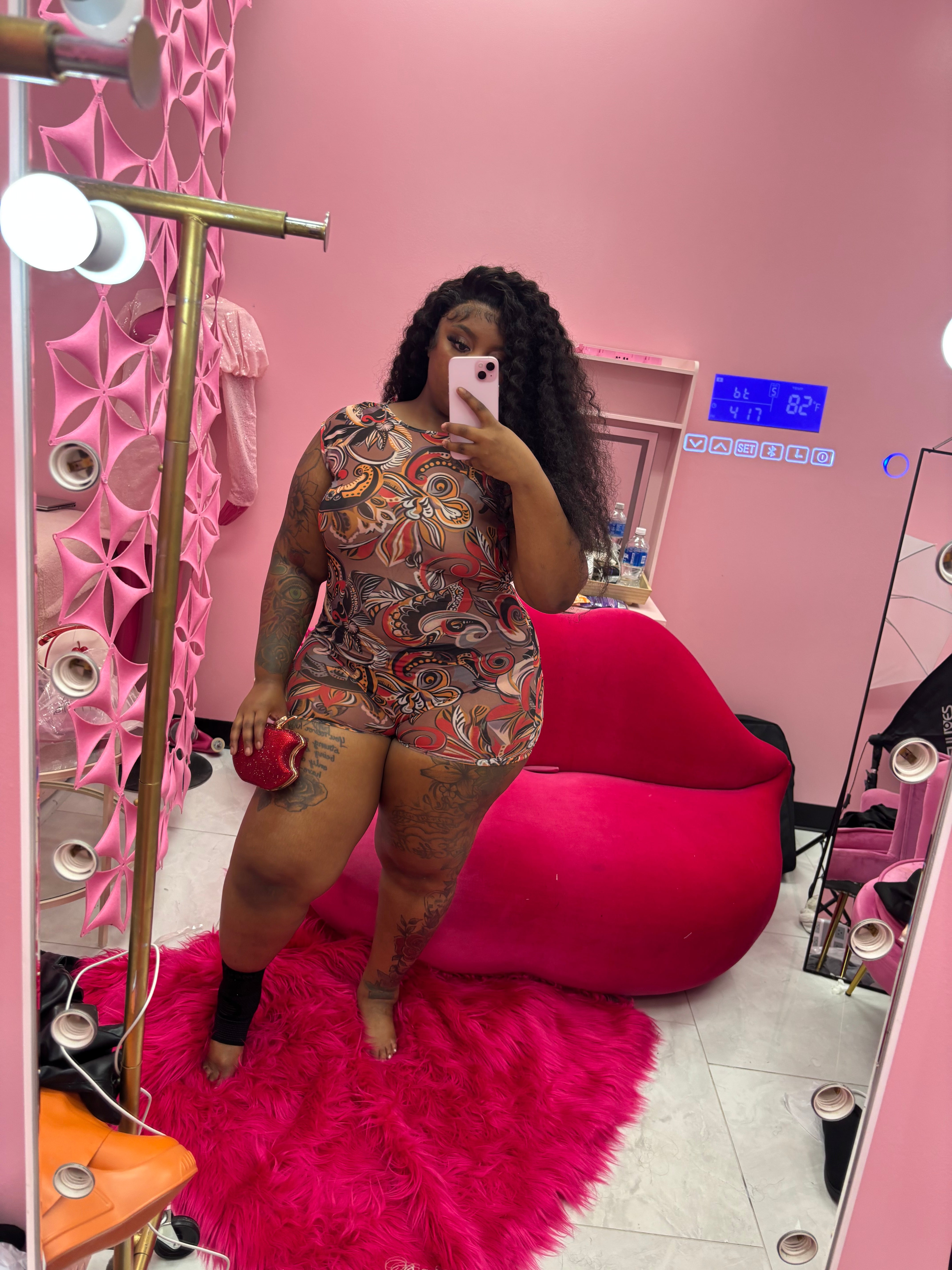 The Swirl Sheer Back out Romper