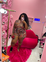The Swirl Sheer Back out Romper